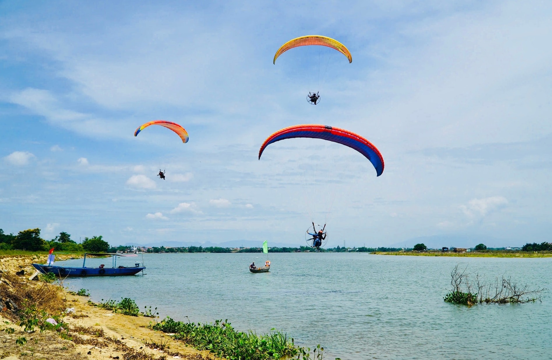 Aerial view of Con Nam Ngan islet during paragliding in Hoi An Vietnam